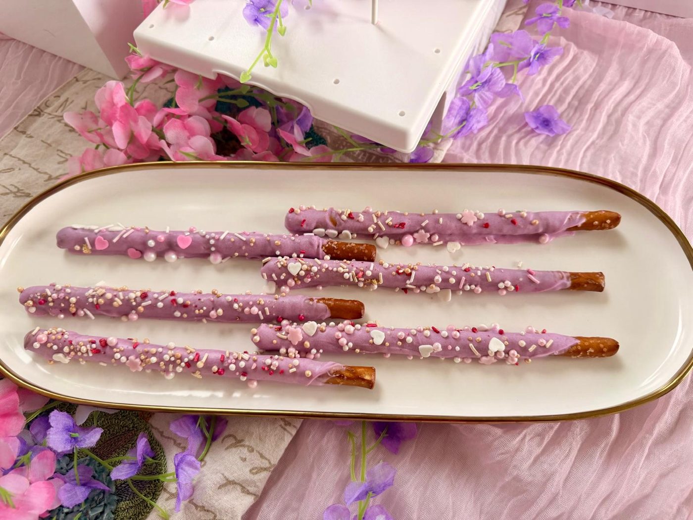Lilac dipped pretzel rods